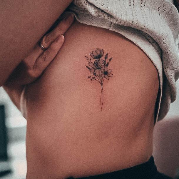 Woman With Fabulous Simple Flower Tattoo Design