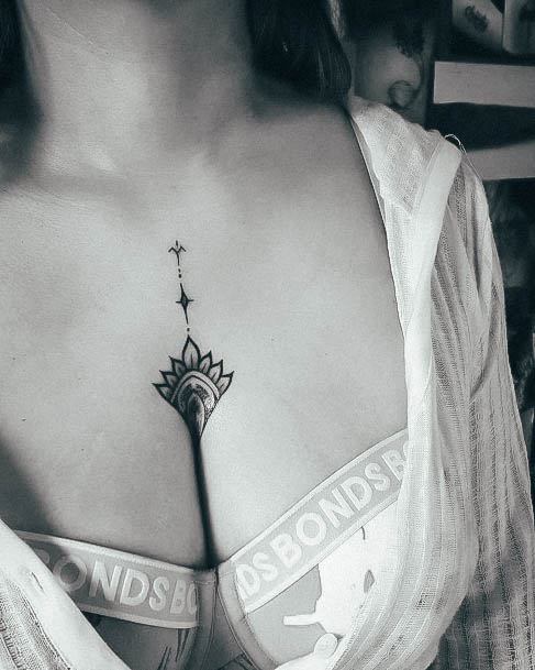 Woman With Fabulous Small Chest Tattoo Design