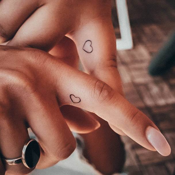 Woman With Fabulous Small Hand Tattoo Design