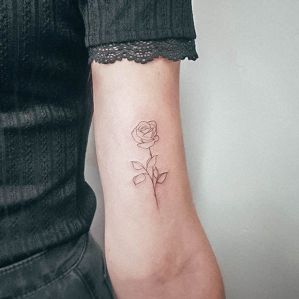 Woman With Fabulous Small Rose Tattoo Design