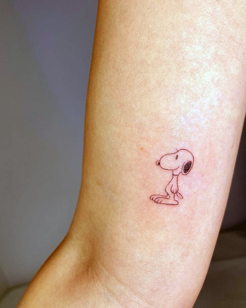 Woman With Fabulous Snoopy Tattoo Design