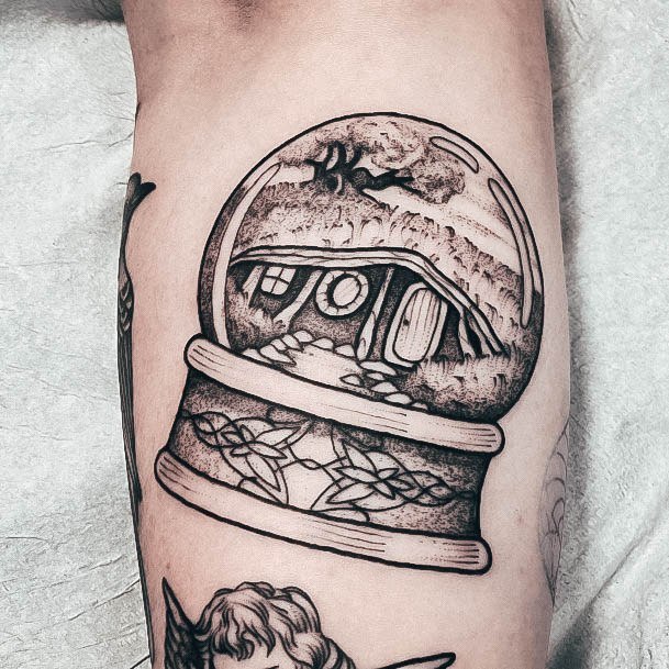 Woman With Fabulous Snowglobe Tattoo Design