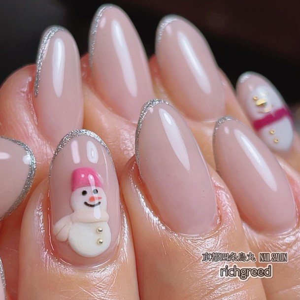 Woman With Fabulous Snowman Nail Design