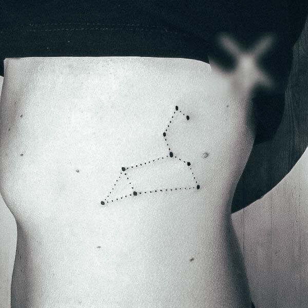 Woman With Fabulous Star Tattoo Design