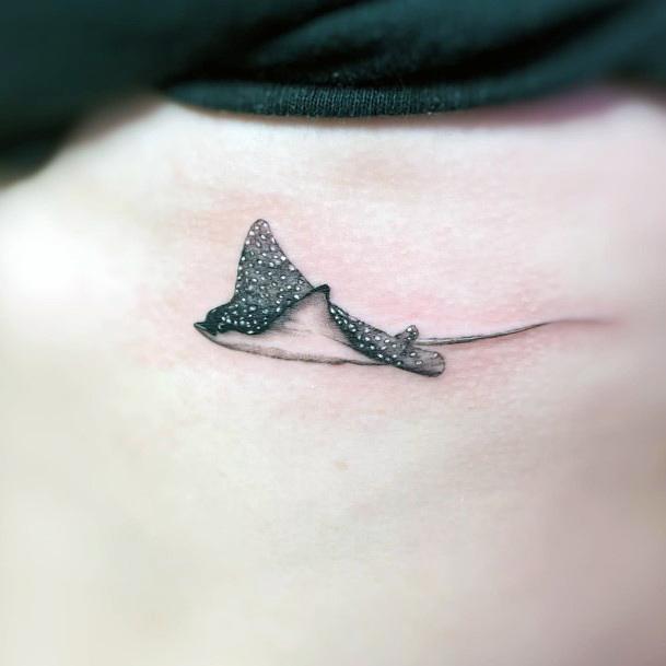 Woman With Fabulous Stingray Tattoo Design