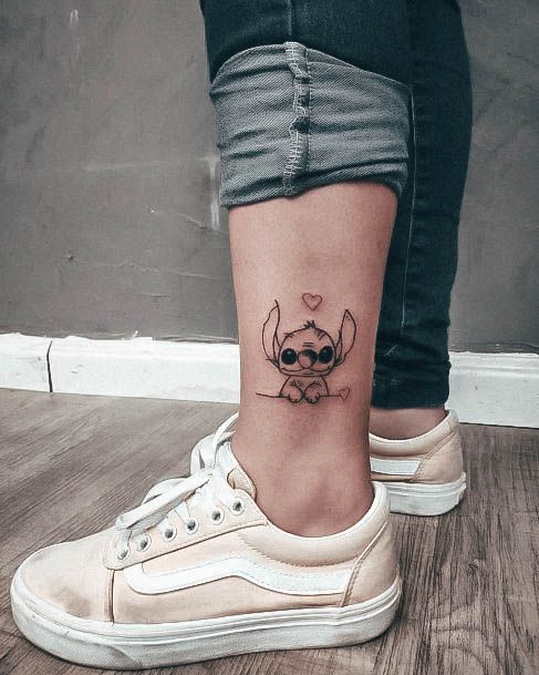 Woman With Fabulous Stitch Tattoo Design