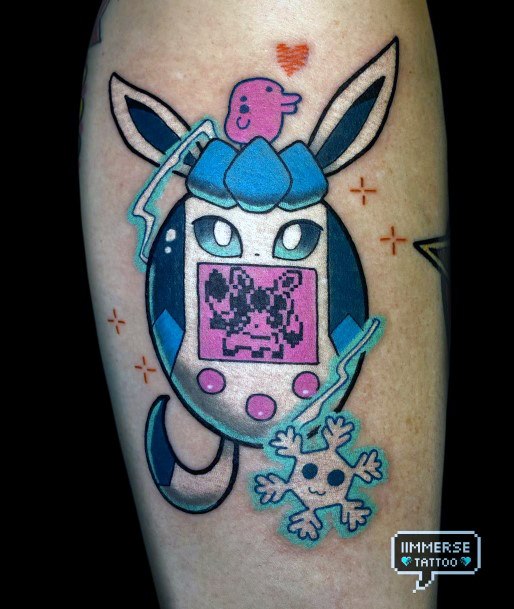 Woman With Fabulous Tamagotchi Tattoo Design