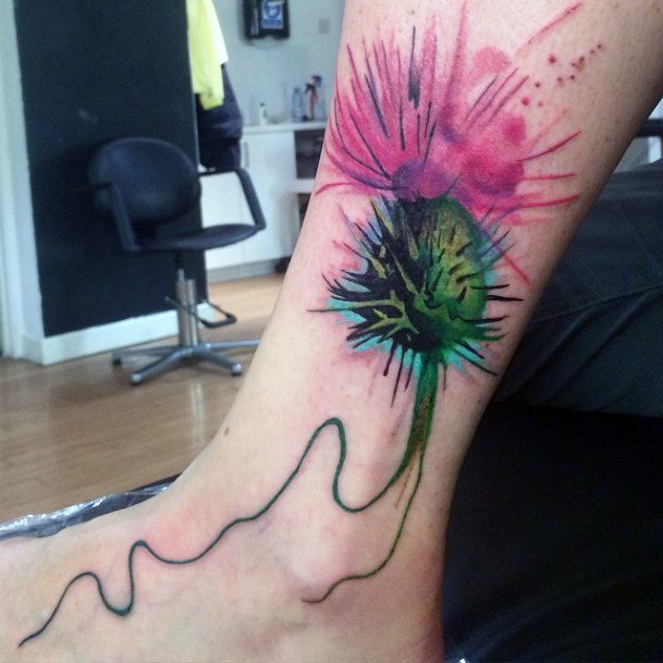 Woman With Fabulous Thistle Tattoo Design