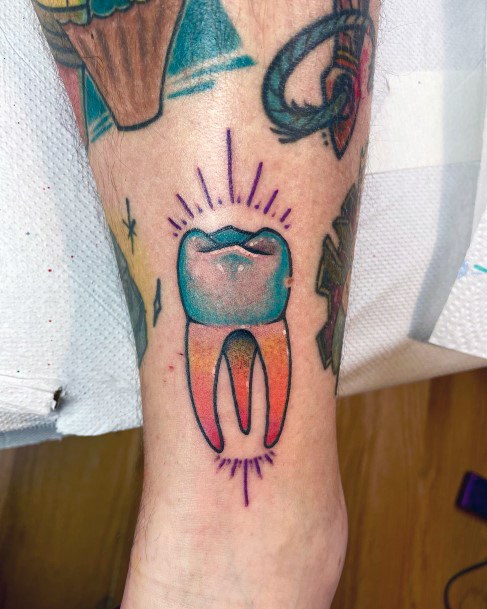 Woman With Fabulous Tooth Tattoo Design