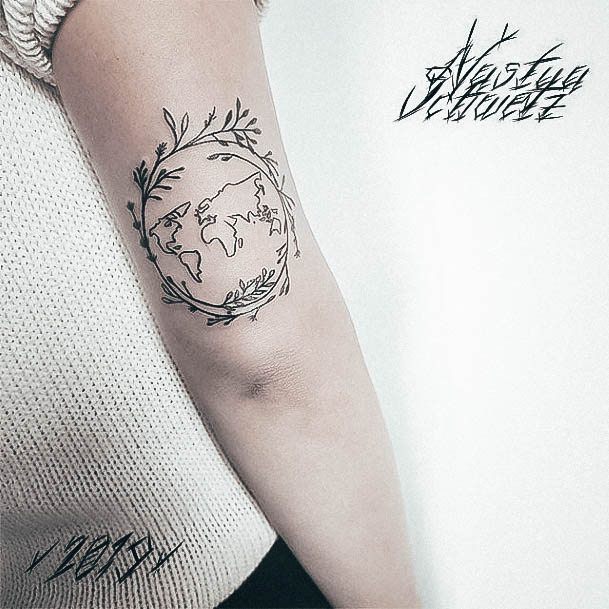 Woman With Fabulous Travel Tattoo Design