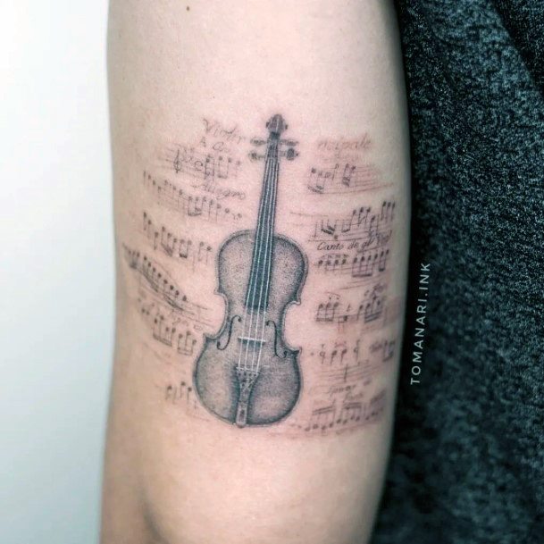 Woman With Fabulous Violin Tattoo Design