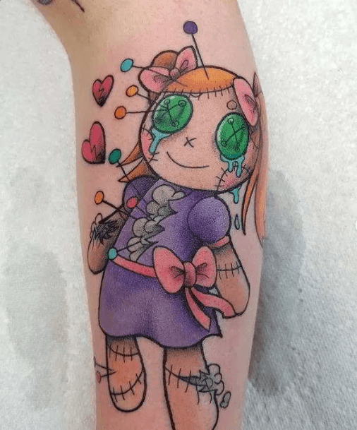 Woman With Fabulous Voodoo Doll Tattoo Design