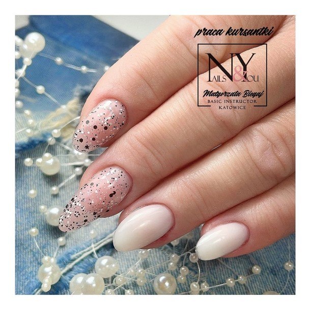 Woman With Fabulous White Almond Shaped Nail Design