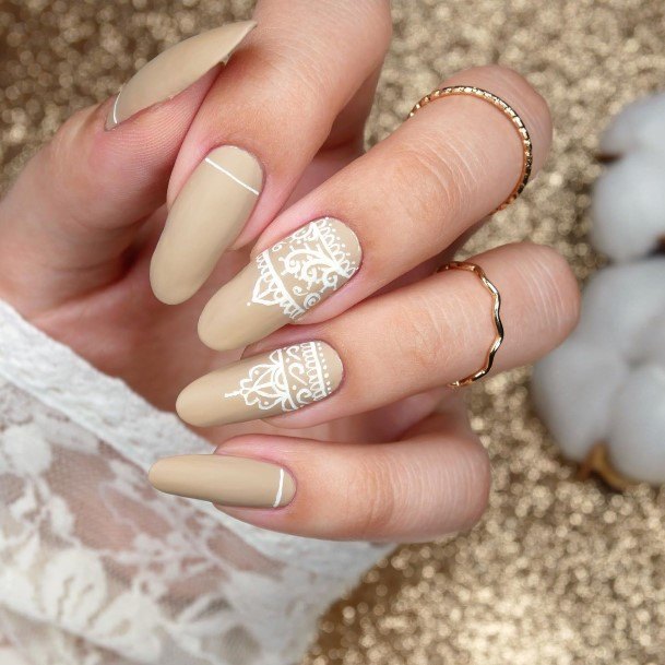 Woman With Fabulous White And Nude Nail Design