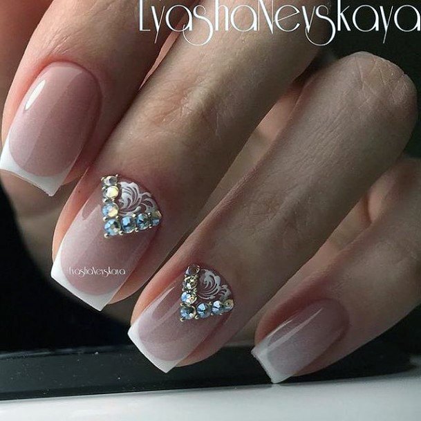 Woman With Fabulous White With Rhinestones Nail Design