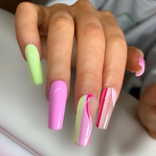 Woman With Fabulous Yellow And Pink Nail Design