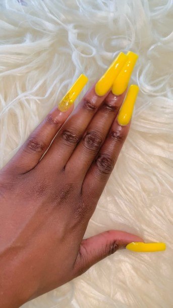 Woman With Fabulous Yellow Square Nail Design