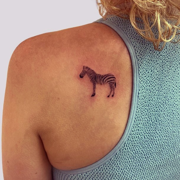 Woman With Fabulous Zebra Tattoo Design