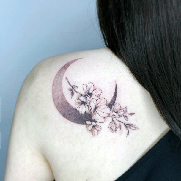 Woman With Flower Moon Tattoo