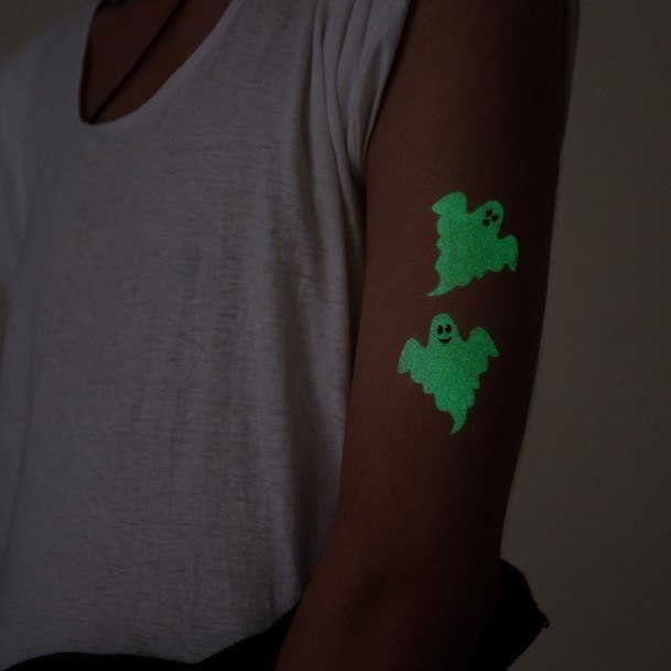 Woman With Glow In The Dark Tattoo Uv Ink Ghosts Arm