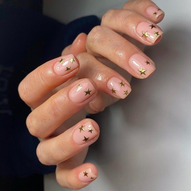 Woman With Gold Nail