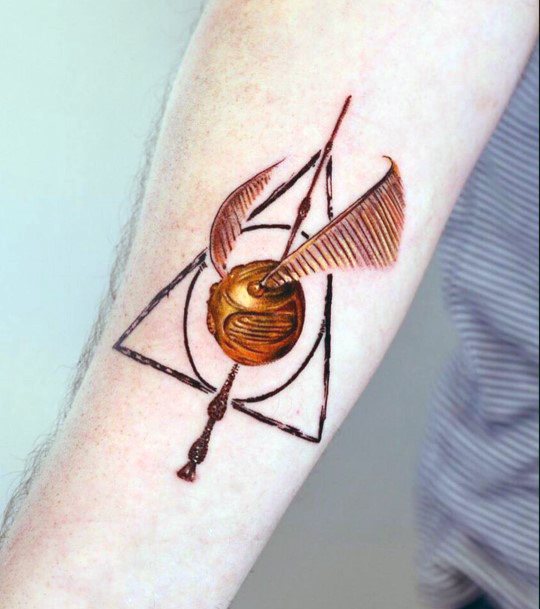 Woman With Golden Snitch Tattoo