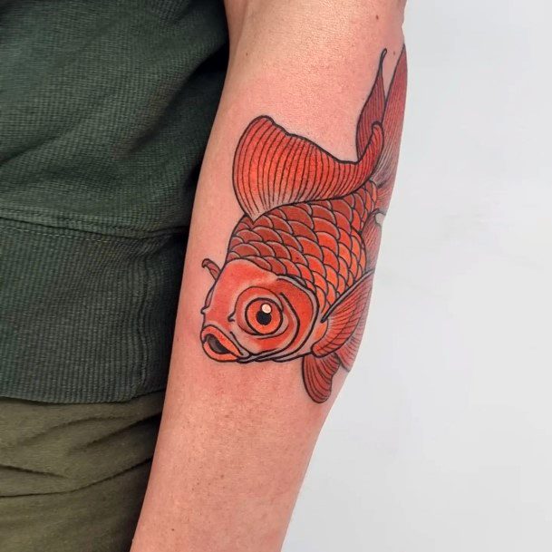 Woman With Goldfish Tattoo