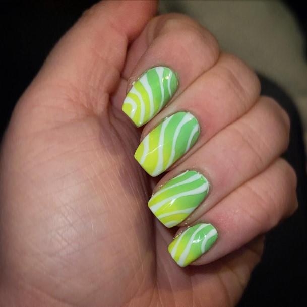 Woman With Green And Yellow Nail