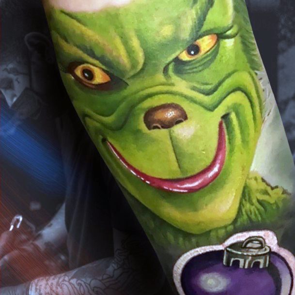 Woman With Grinch Tattoo