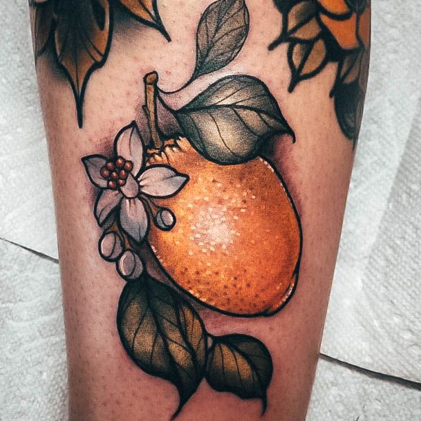 Woman With Lemon Tattoo