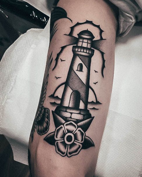 Woman With Lighthouse Tattoo