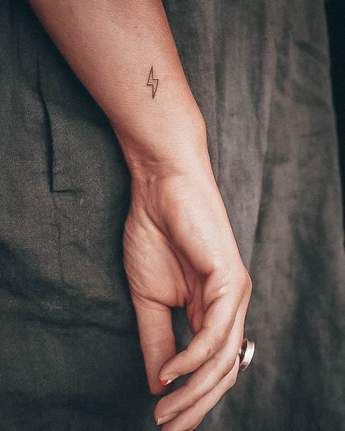 Woman With Lightning Bolt Tattoo