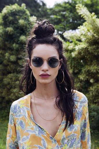 Woman With Long Black Hair In A Half Top Half Down Top Knot Hairstyles