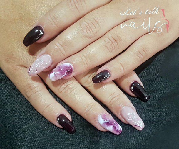 Woman With Maroon And Pink Nail