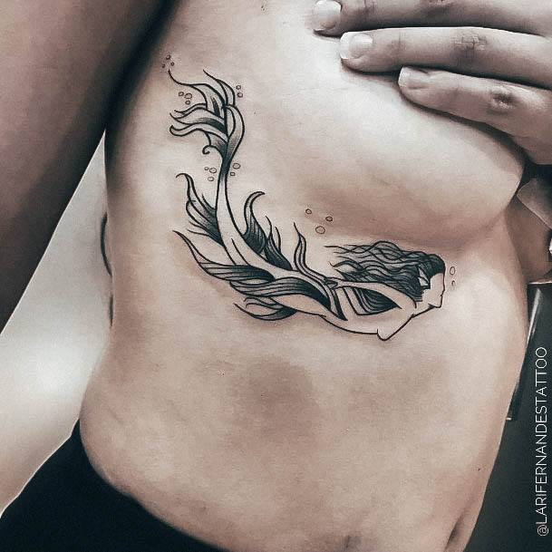 Woman With Mermaid Tattoo