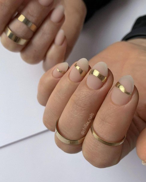 Woman With Metallic Gold Nail