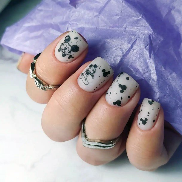 Woman With Mickey Mouse Nail