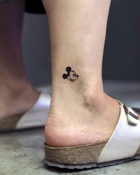 Woman With Mickey Mouse Tattoo