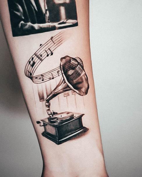 Woman With Music Tattoo