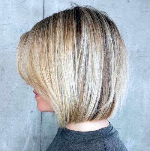 Woman With Natural Looking Blonde Bob Hair Hassle Free Style