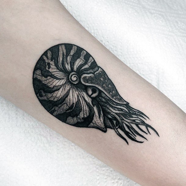 Woman With Nautilus Tattoo