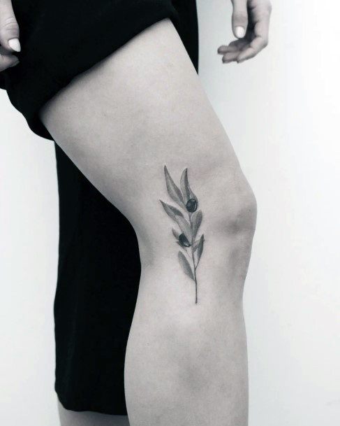 Woman With Olive Branch Tattoo