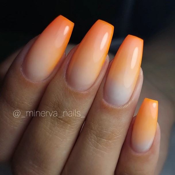 Woman With Orange Ombre Nail