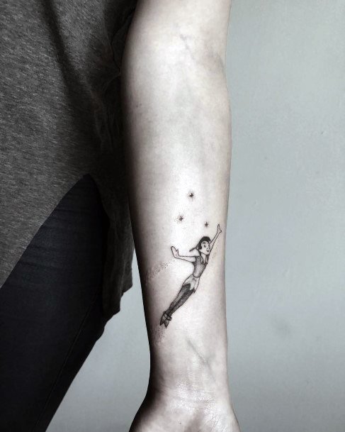 Woman With Peter Pan Tattoo