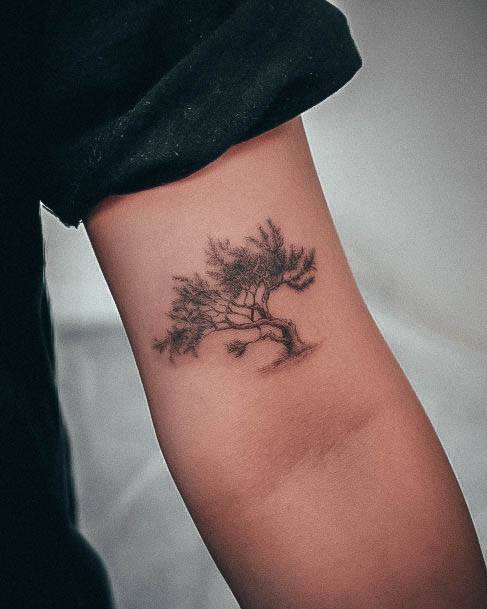 Woman With Pine Tree Tattoo