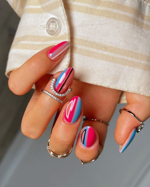 Woman With Pink And Blue Nail