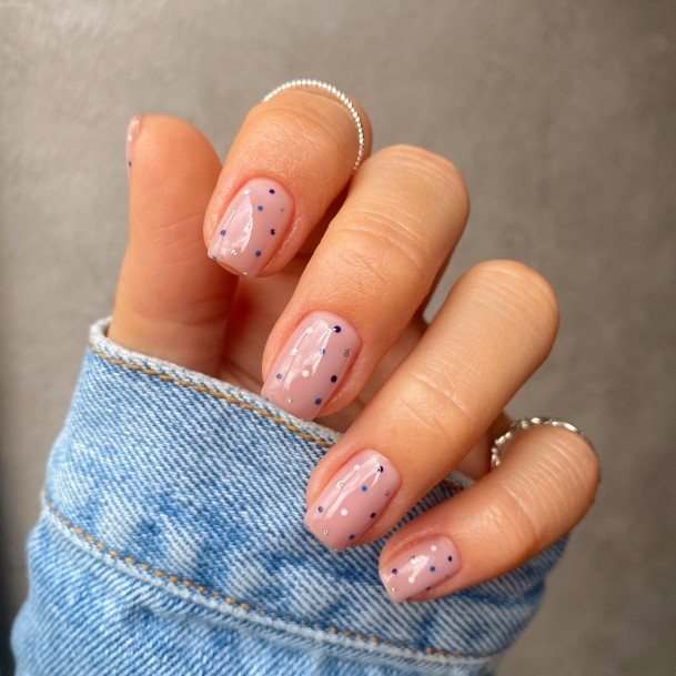 Woman With Polka Dot Nail