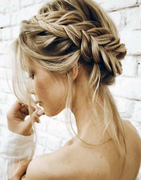 Woman With Pretty Wrapped Fishbone Braid Updo Hairstyle Blonde Hair