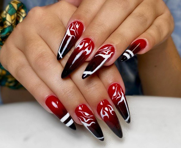 Woman With Red And Black Nail