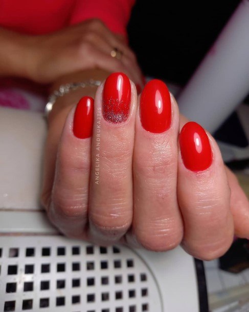 Woman With Red And Silver Nail